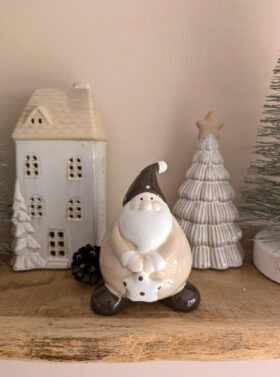 Figurine petit père noël dodu en céramique