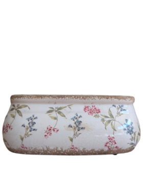 Jardinière en céramique avec motifs floraux | Coloris blanc, bleu et rose.